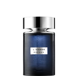 Flacon de L'Homme Rochas — parfum boisé pour homme