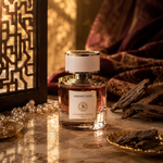 Ghost Oud Signature Royale – flacon de parfum oud intense en ambiance sombre
